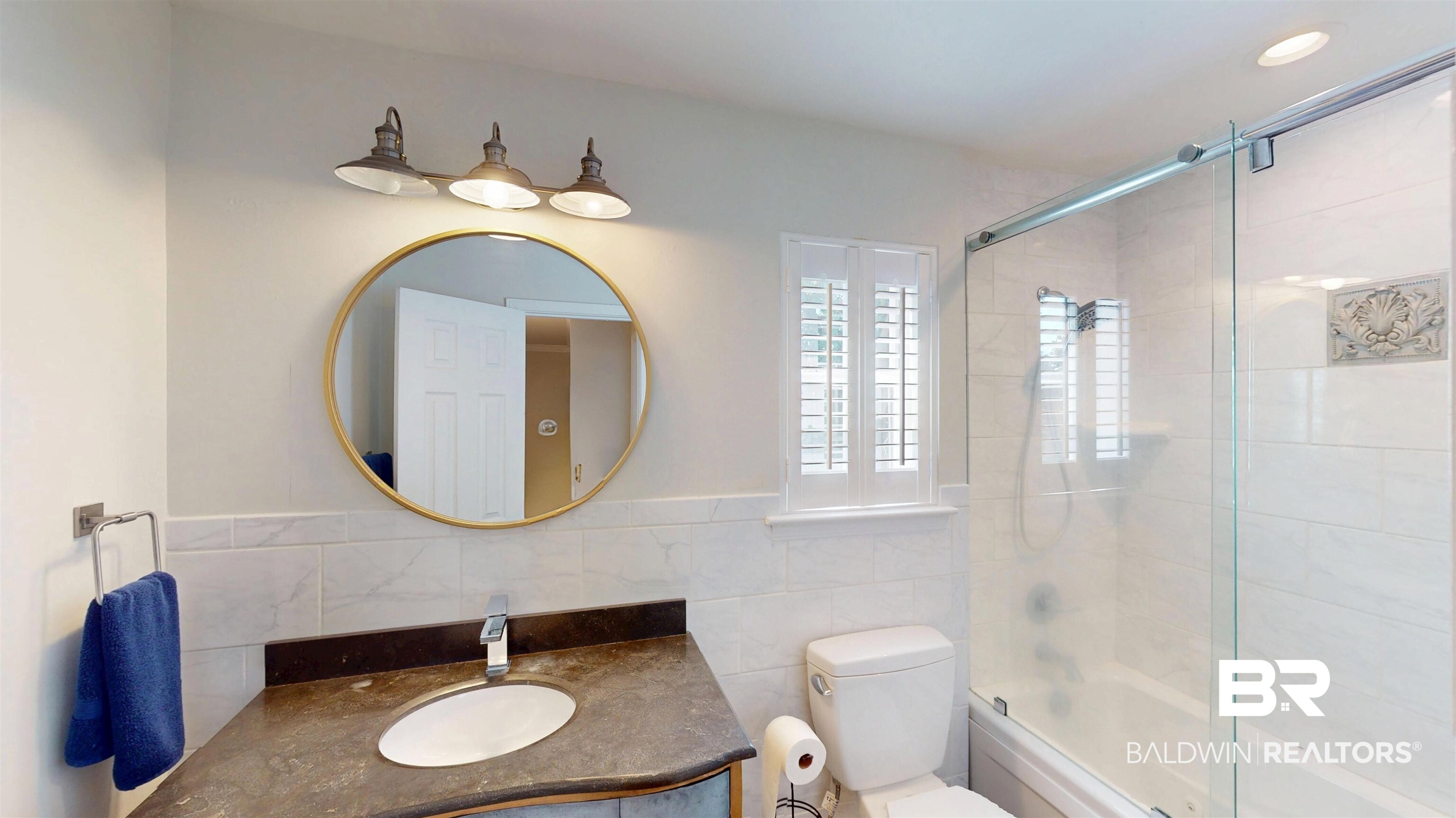 100 Du Rhu Drive, Unit J Mobile, AL 36608 - Photo 13 of 17 Full bath with vanity, shower / bath combination with glass door, and tile walls