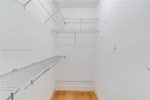 a view of a room with racks on the wall