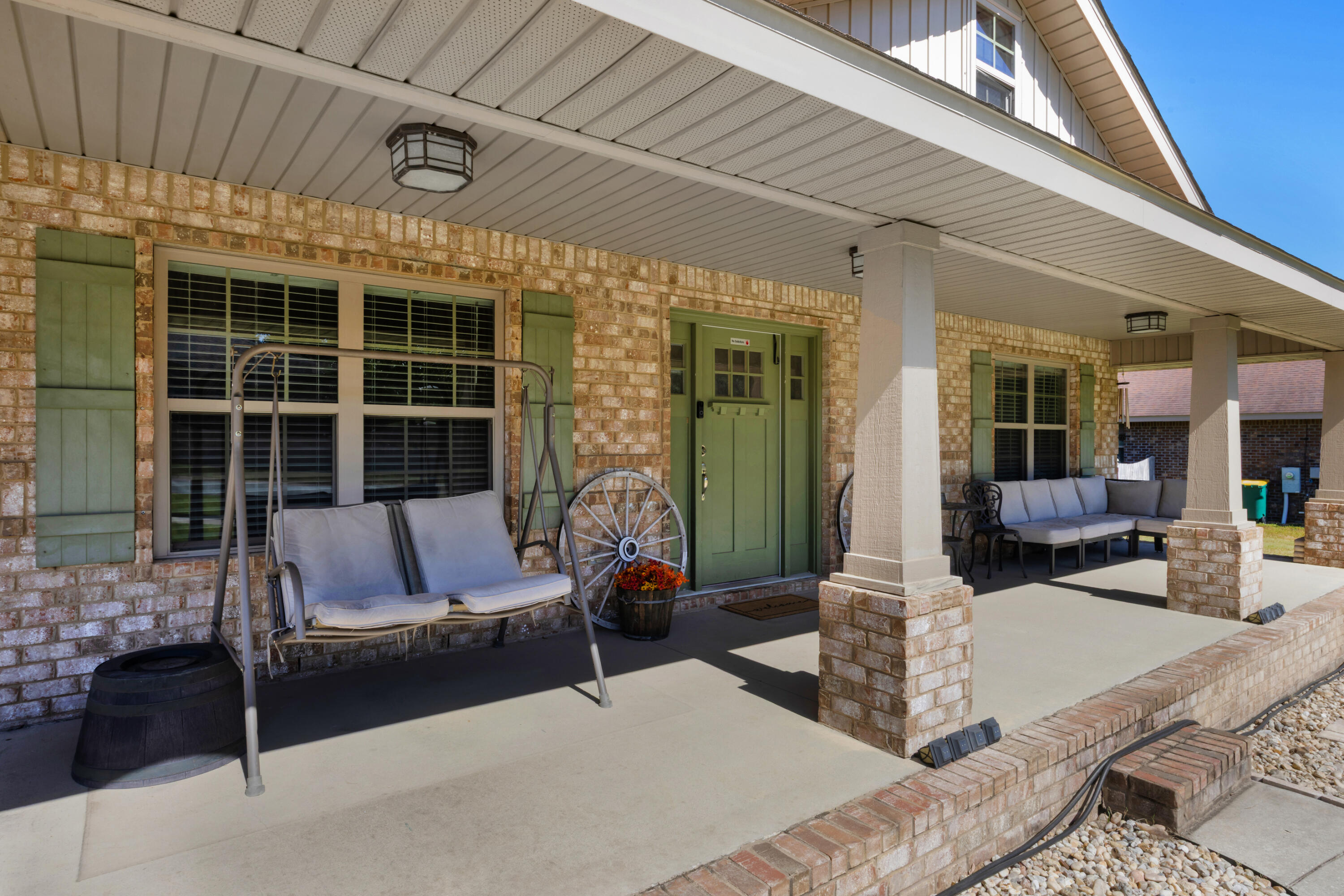 2428 Genevieve Way Crestview, FL 32536 - Photo 1 of 53 a swimming pool with outdoor seating
