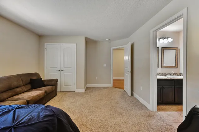 a bathroom with a double vanity sink and a mirror