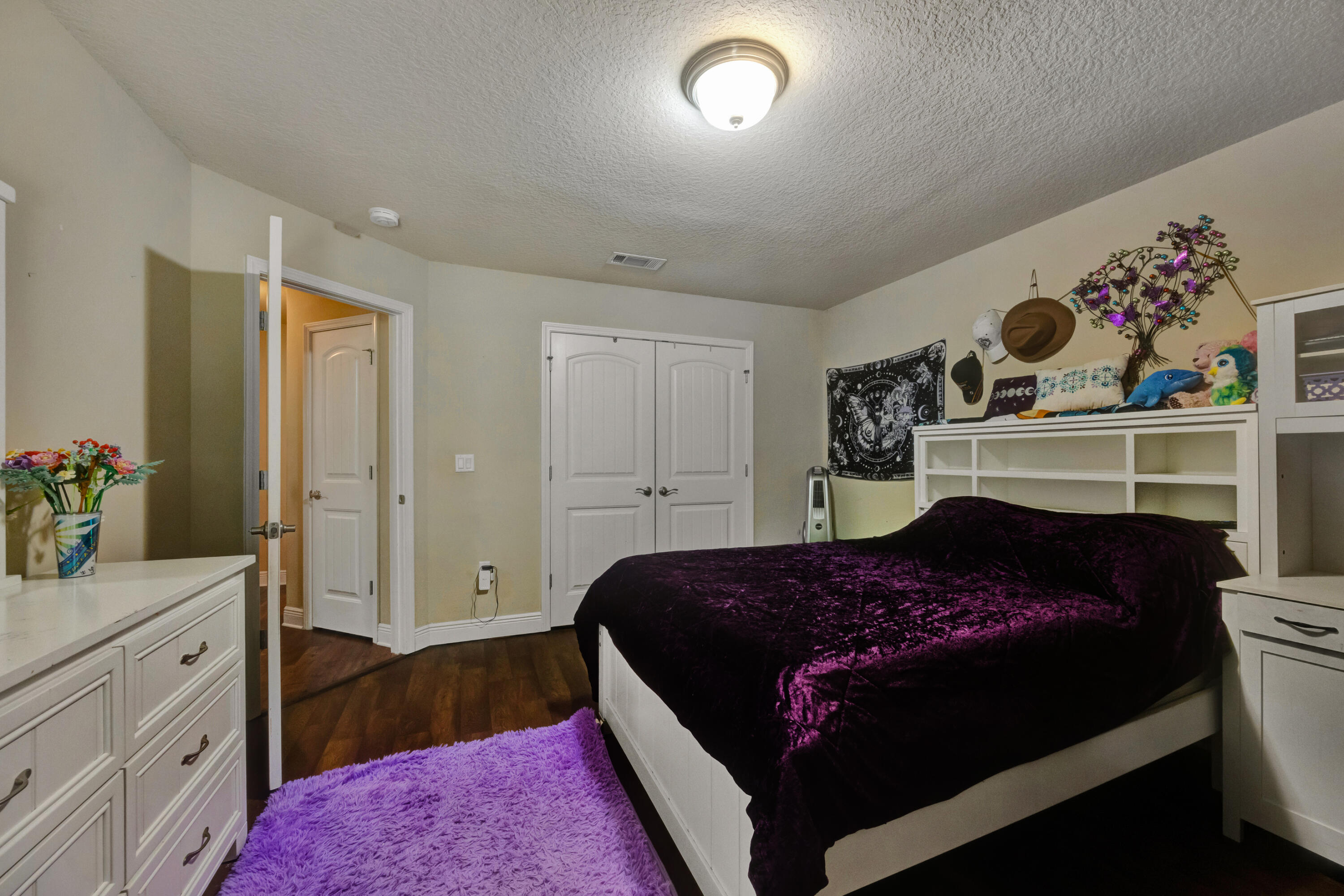 2428 Genevieve Way Crestview, FL 32536 - Photo 33 of 53 a bedroom with a bed and a dresser