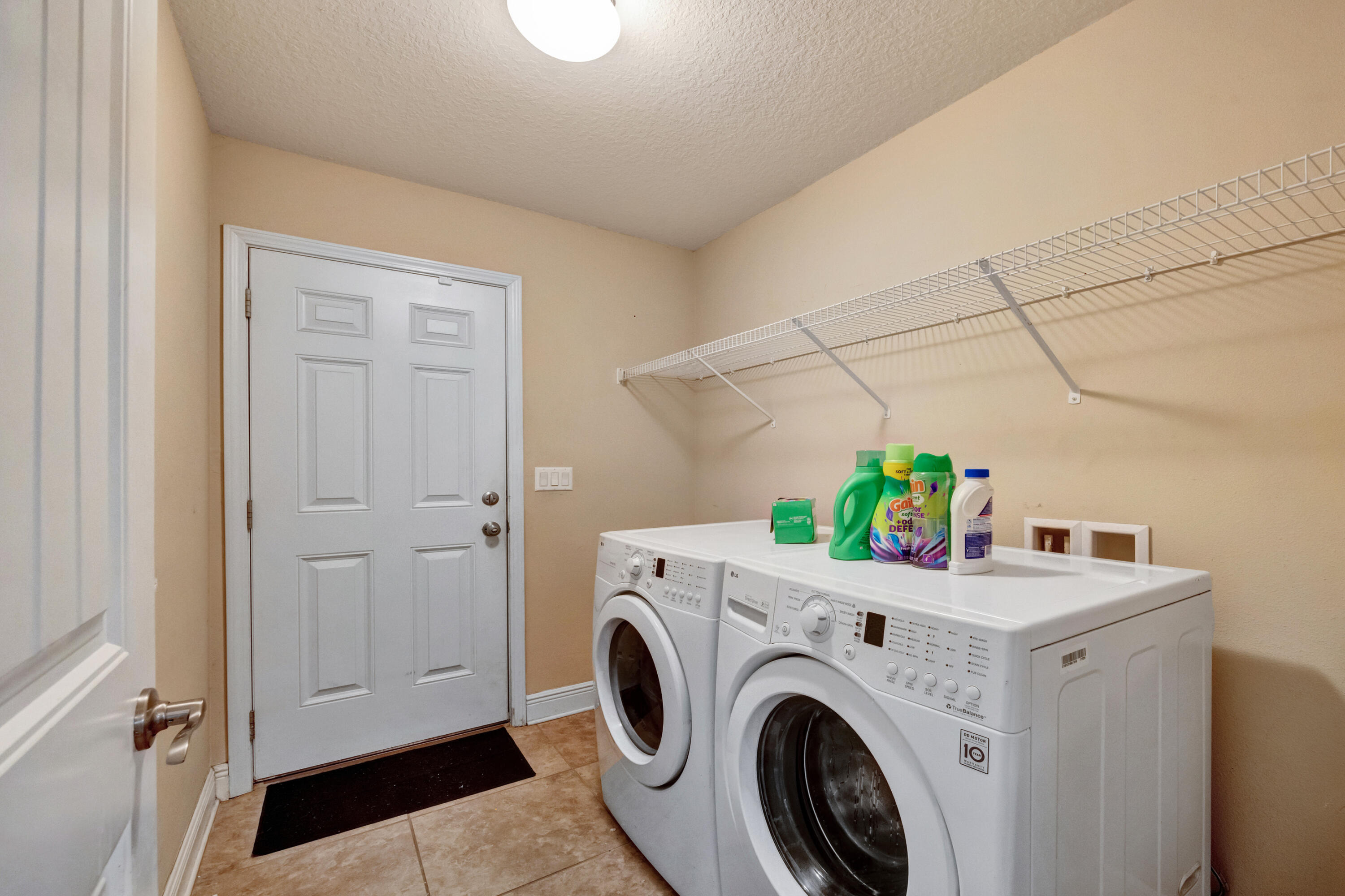 2428 Genevieve Way Crestview, FL 32536 - Photo 38 of 53 a utility room with dryer and washer