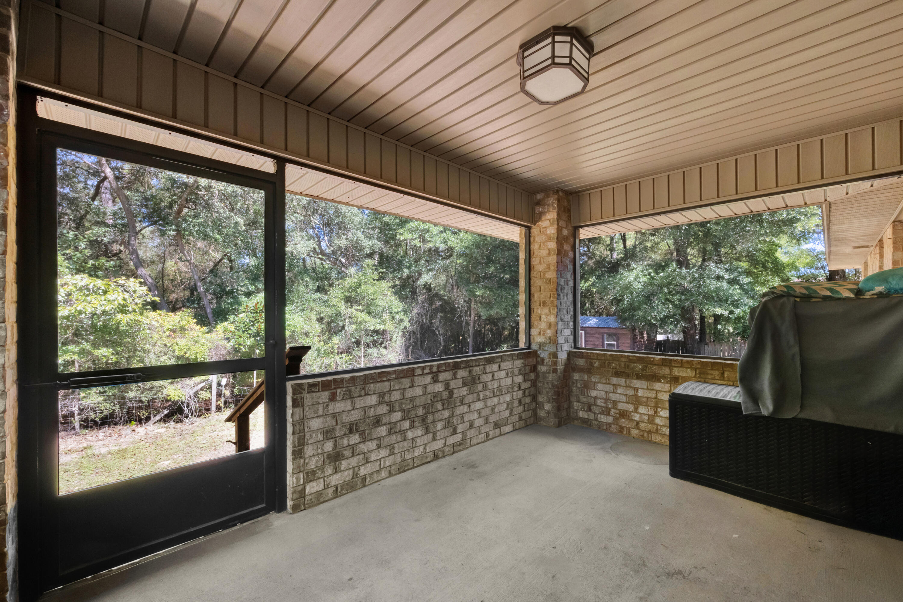 2428 Genevieve Way Crestview, FL 32536 - Photo 39 of 53 a view of a room with furniture wooden floor and windows