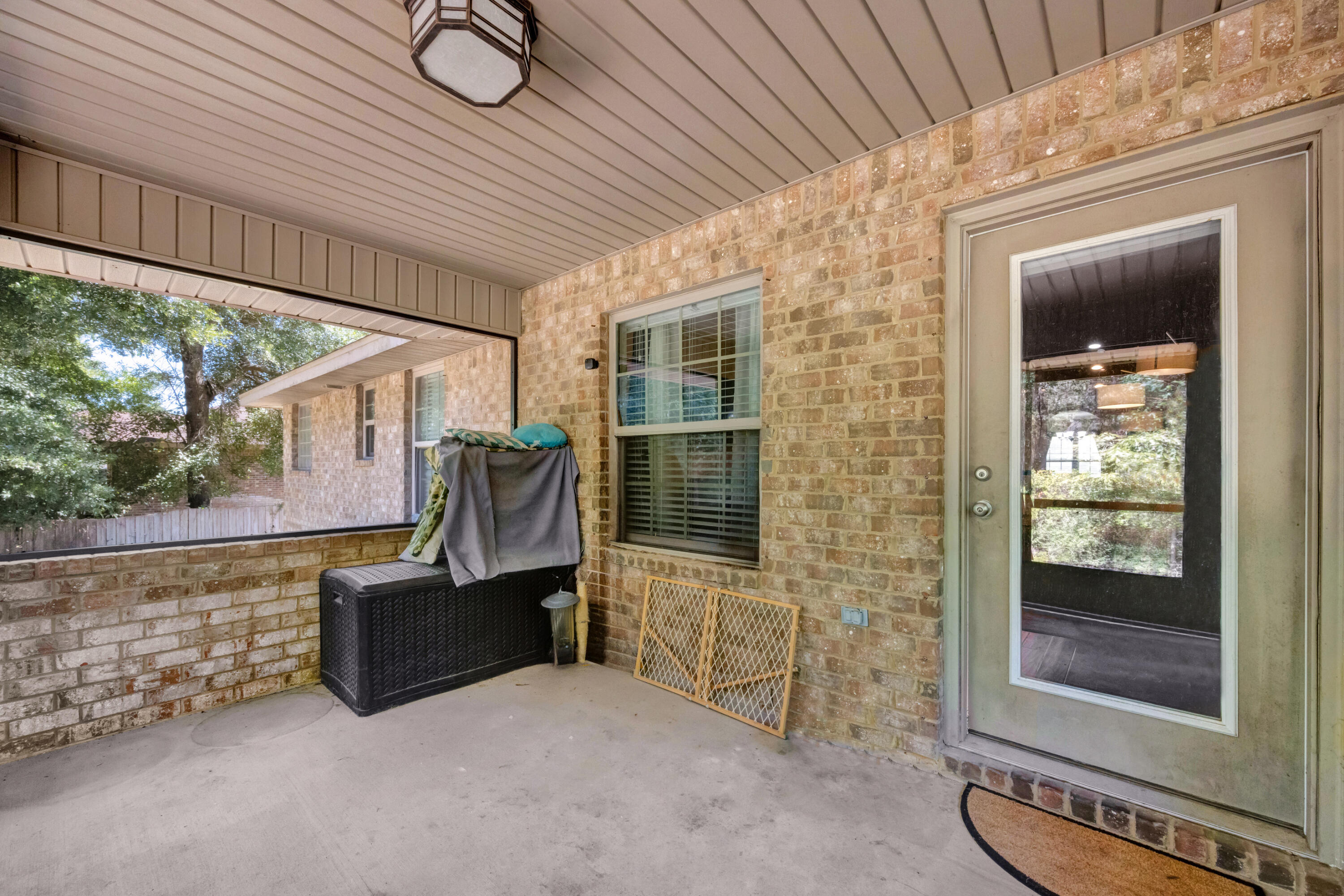 2428 Genevieve Way Crestview, FL 32536 - Photo 40 of 53 a backyard of a house with seating space