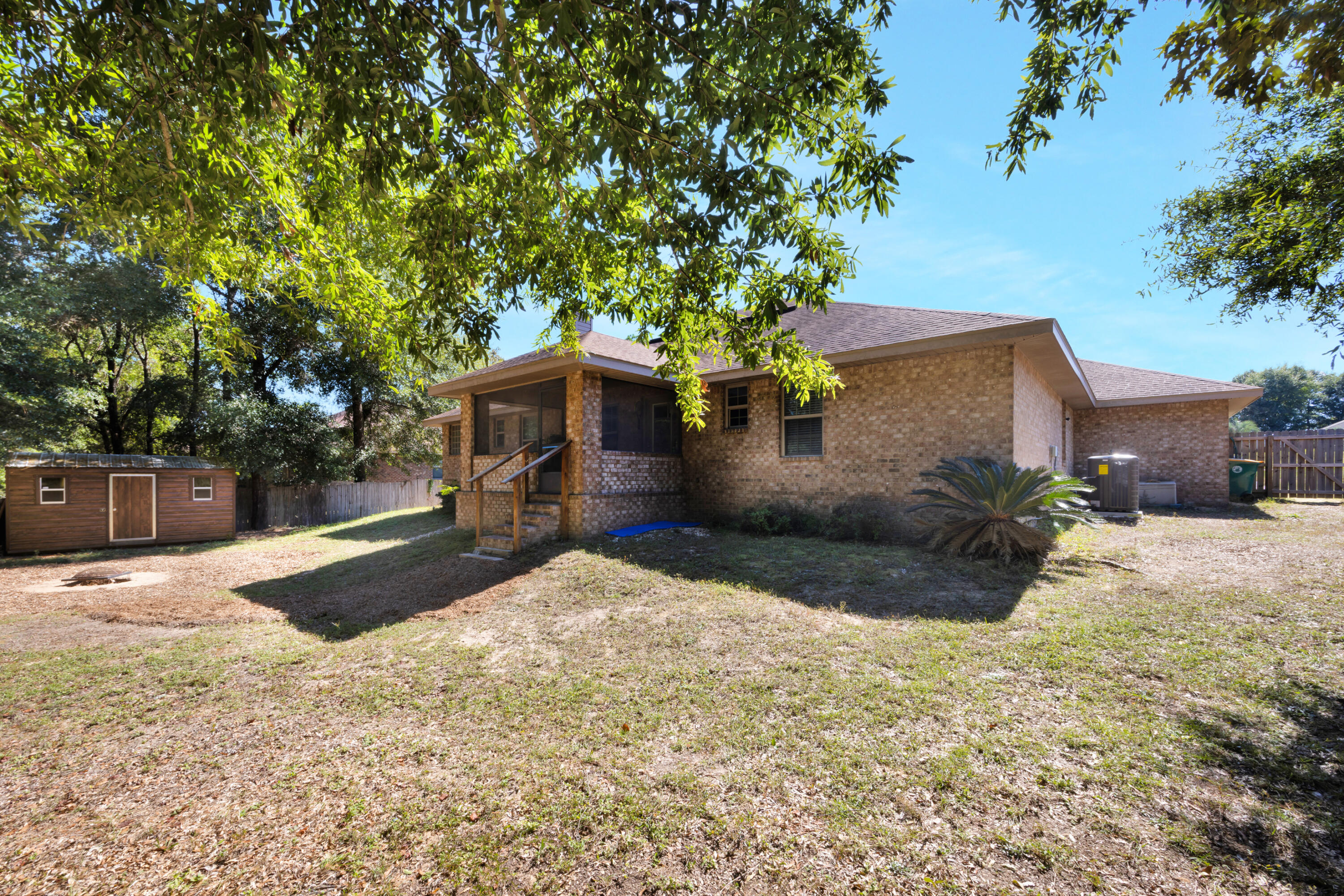 2428 Genevieve Way Crestview, FL 32536 - Photo 42 of 53 a front view of a house with a yard