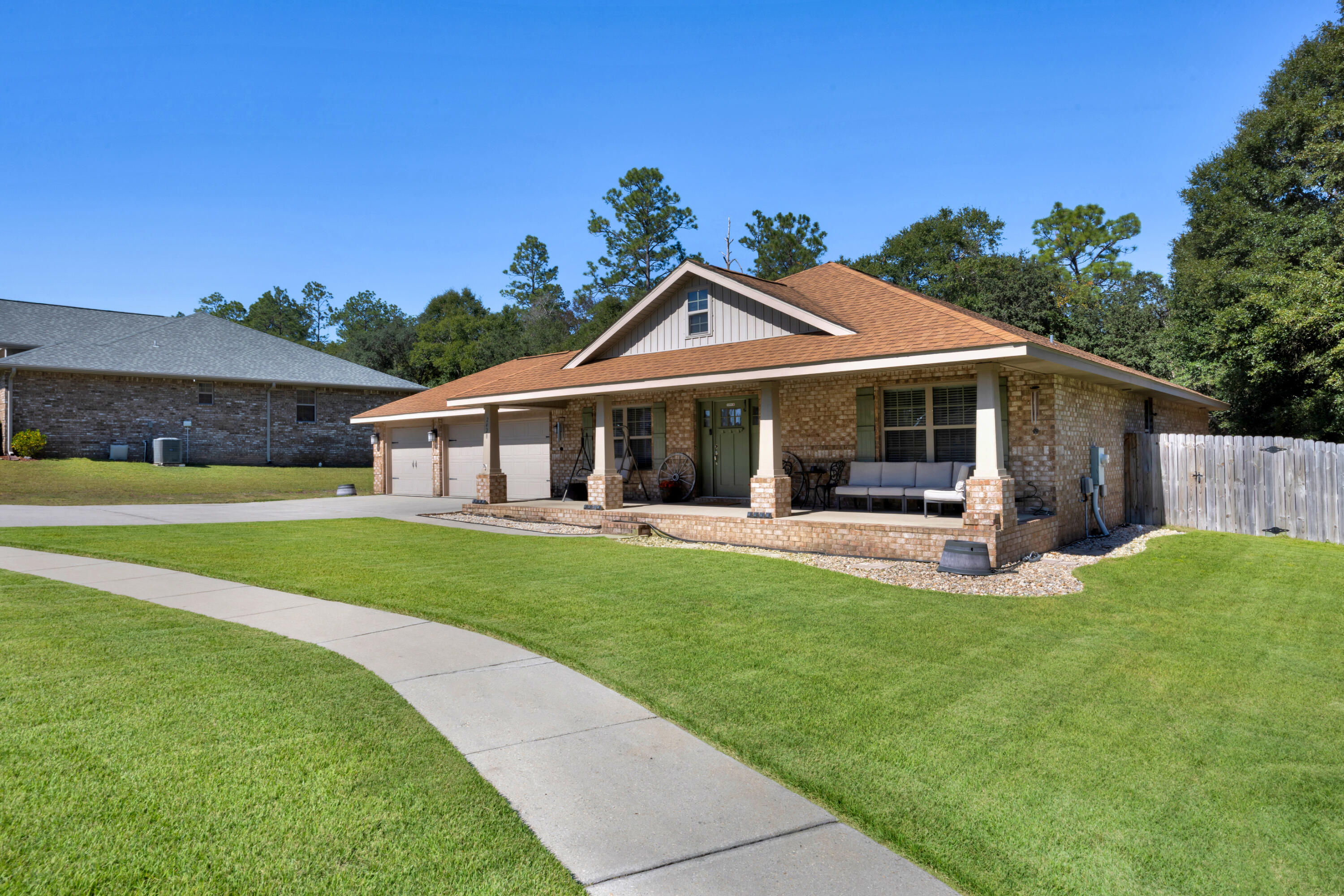 2428 Genevieve Way Crestview, FL 32536 - Photo 46 of 53 a view of a house with a yard porch and sitting area