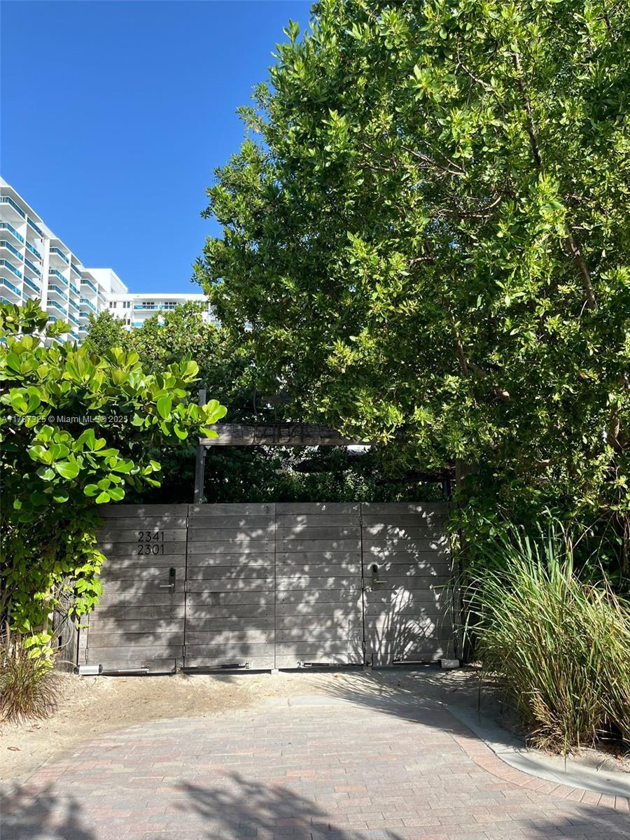 2301 Collins Avenue, Unit 628 Miami Beach, FL 33139 - Photo 18 of 25 a view of a yard with plants and trees beside of it