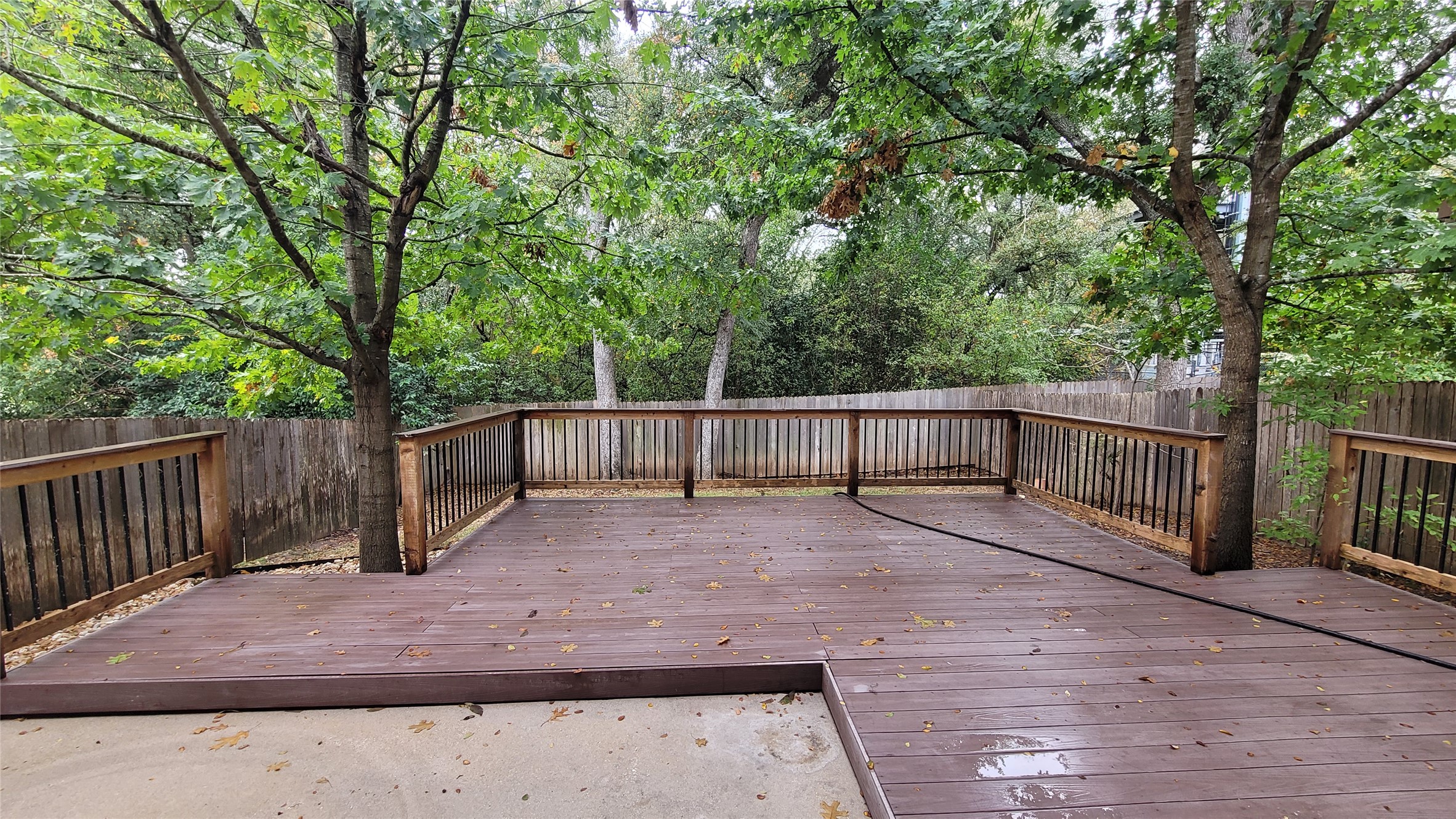 7337 Menchaca Road, Unit #22 Austin, TX 78745 - Photo 22 of 25 Deck featuring a fenced backyard