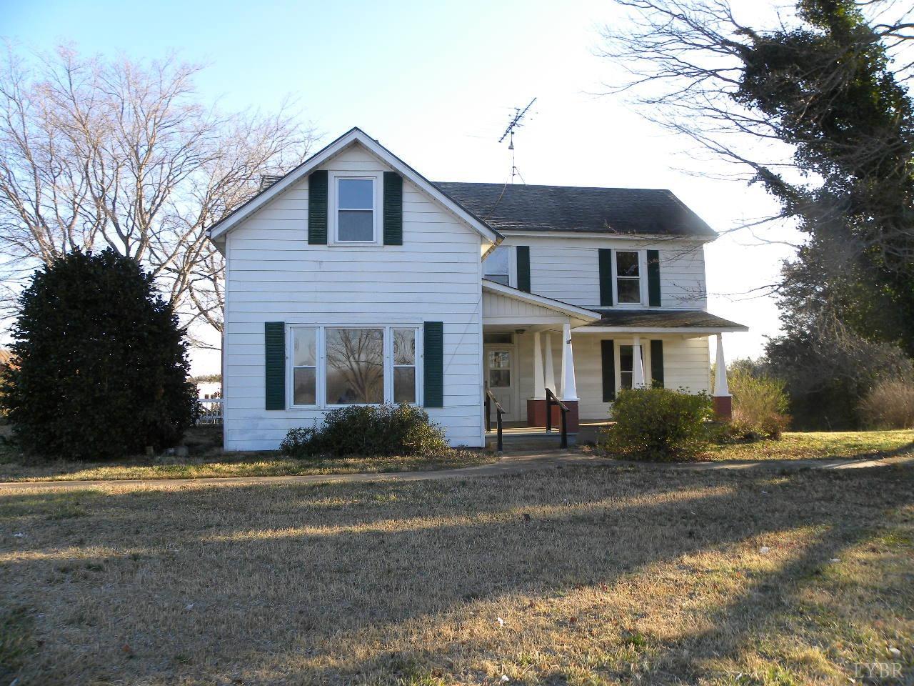 5797 Scuffletown Road Randolph, VA 23962 - Photo 1 of 18 a front view of a house with a yard