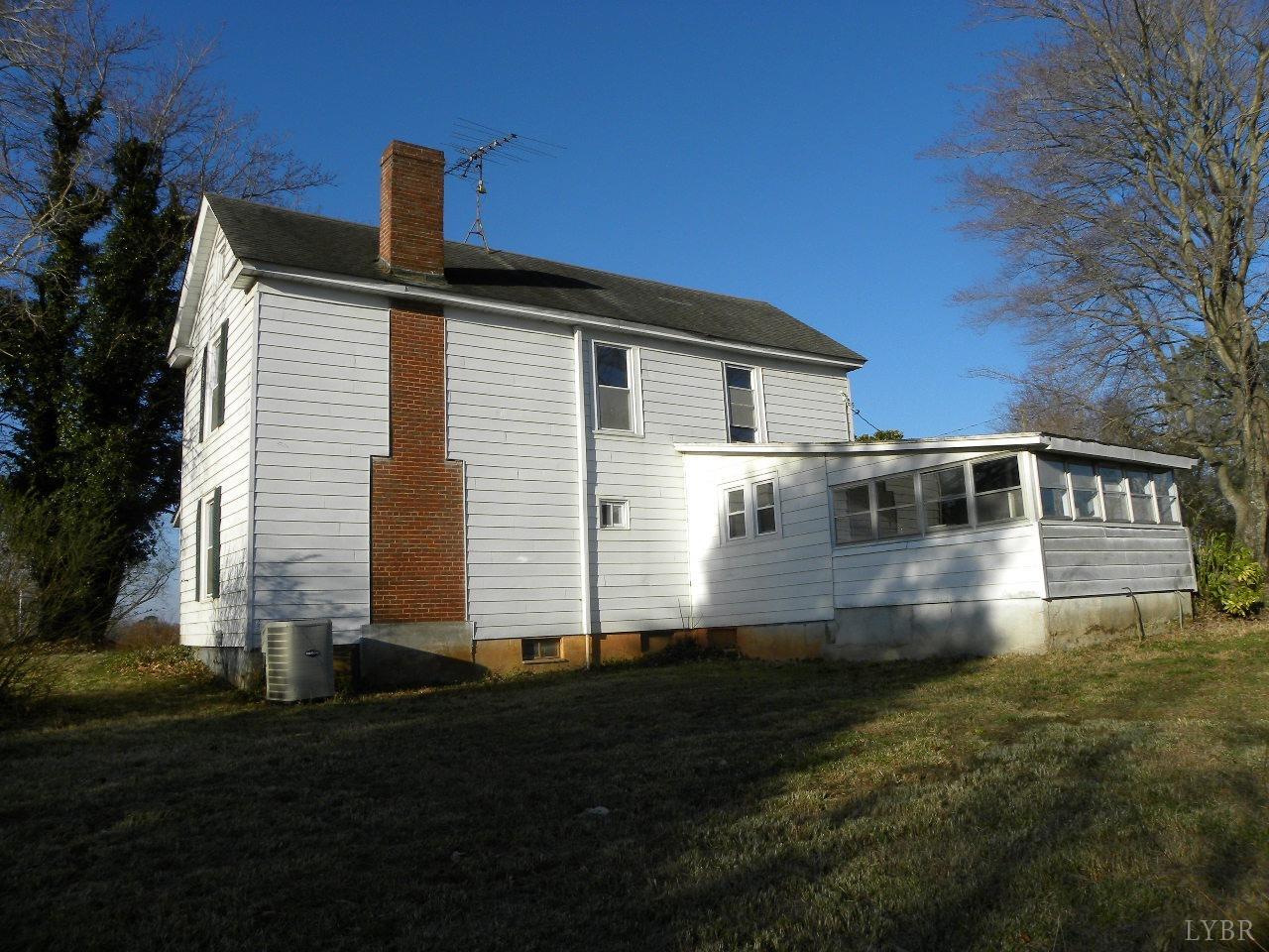 5797 Scuffletown Road Randolph, VA 23962 - Photo 3 of 18 a front view of a house with a yard