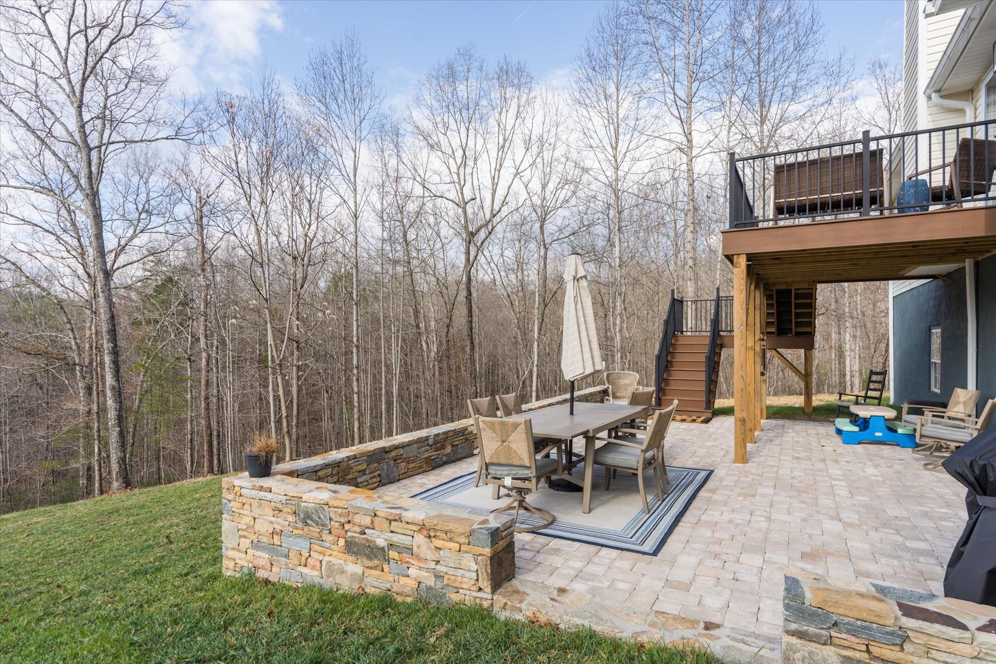 531 Sloping Meadow Mill Spring, NC 28756 - Photo 29 of 46 a view of a dinning tables and chairs in the patio
