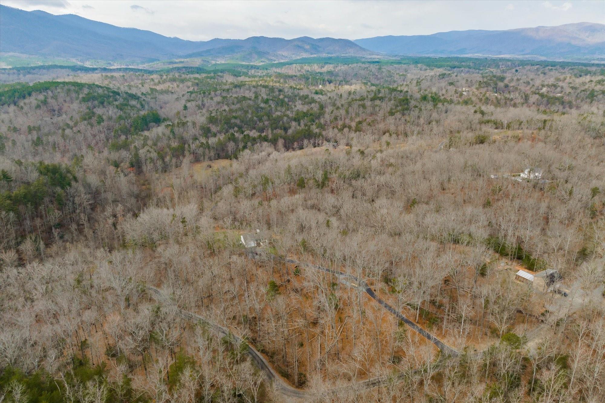 531 Sloping Meadow Mill Spring, NC 28756 - Photo 36 of 46 a view of lake and mountain