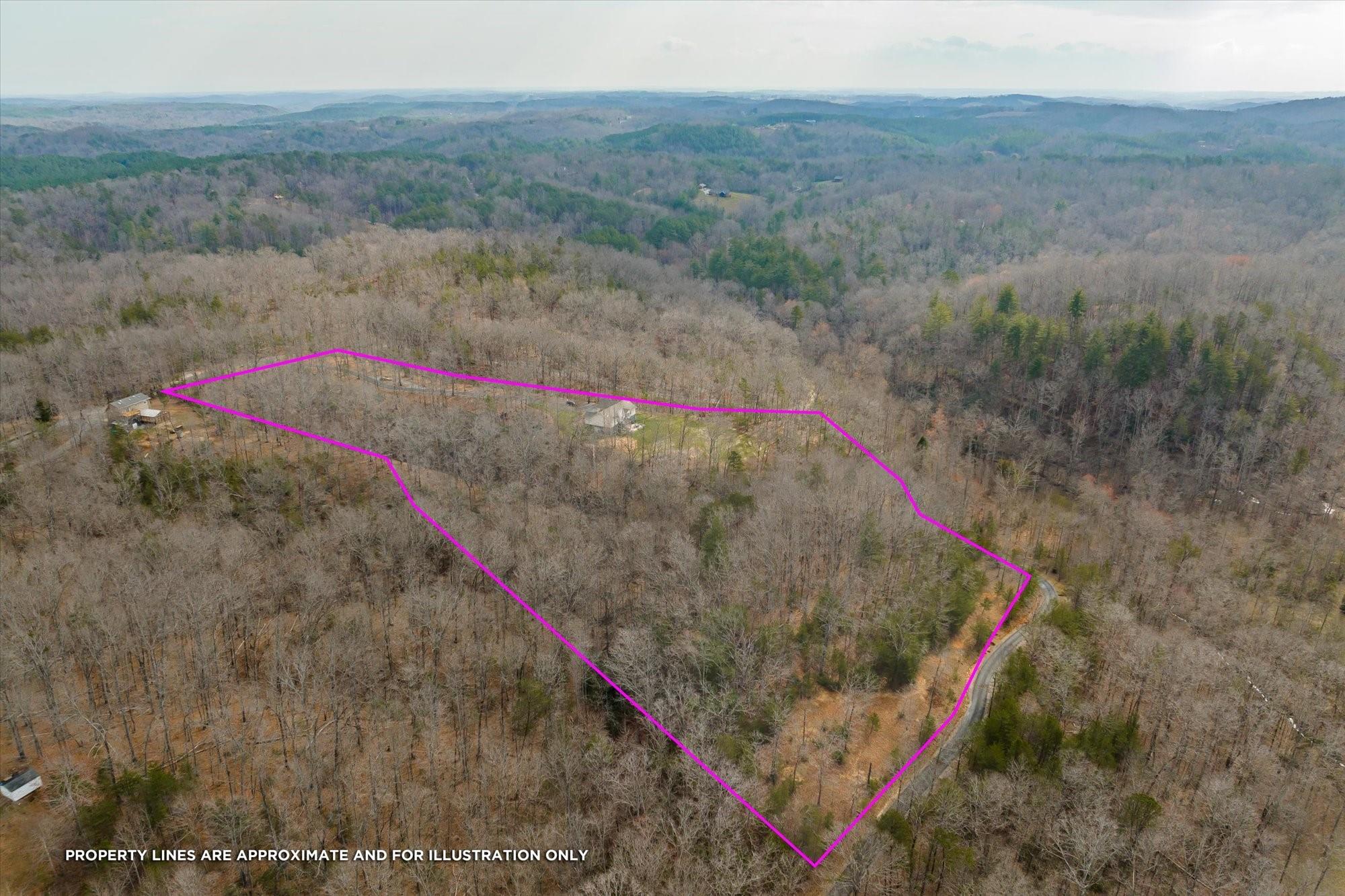 531 Sloping Meadow Mill Spring, NC 28756 - Photo 38 of 46 a view of a road with a dry yard