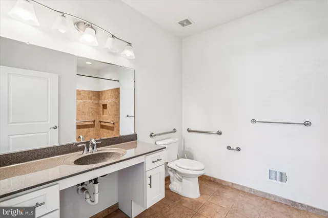a bathroom with a sink and a toilet