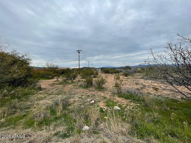 4885 East Lavin Lane, Unit 241 AND 242 Rimrock, AZ 86335 - Photo 5 of 6 a view of a dry yard with wooden fence