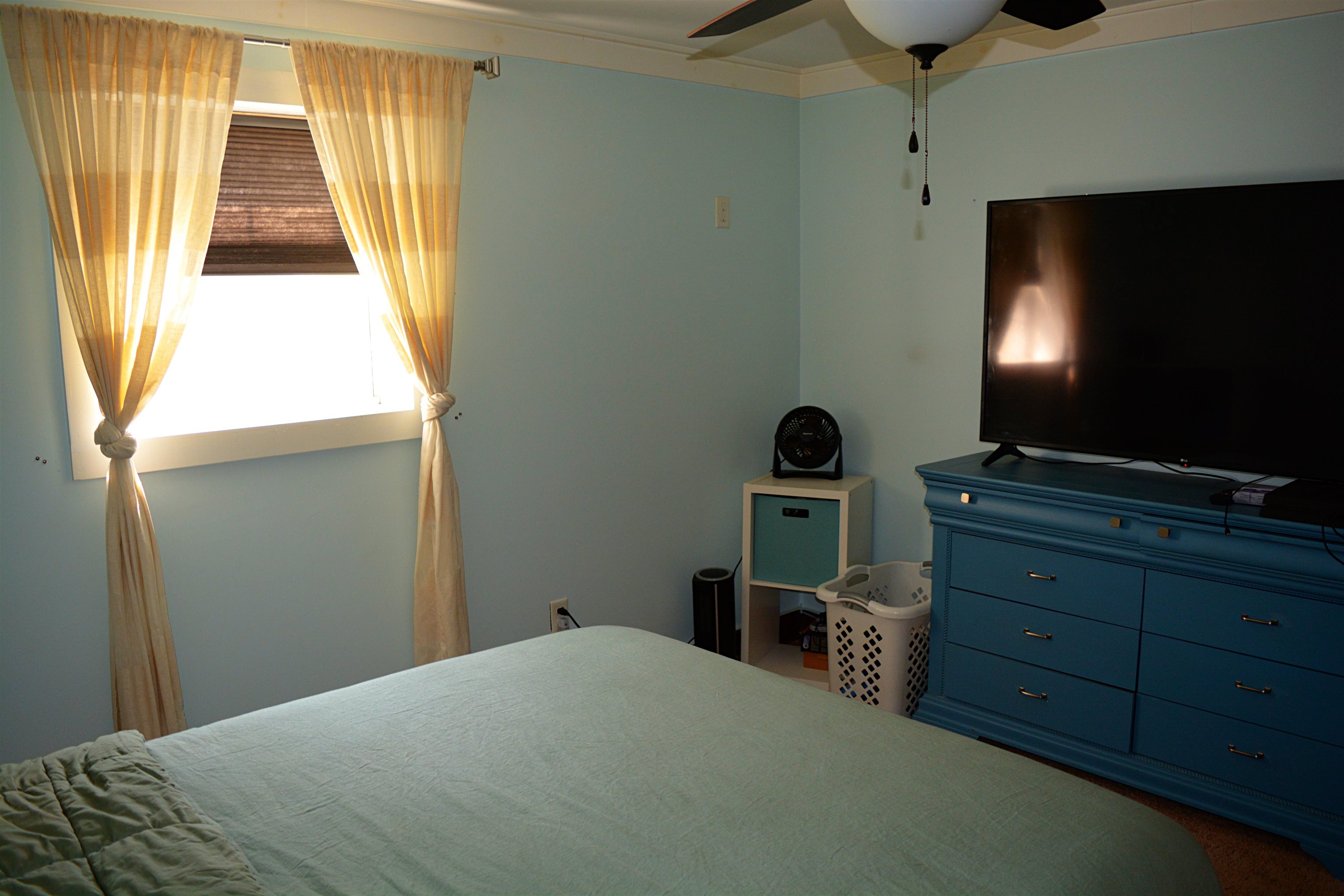 114 William Road Ruckersville, VA 22968 - Photo 16 of 19 a bedroom with a bed and a flat tv screen on dresser