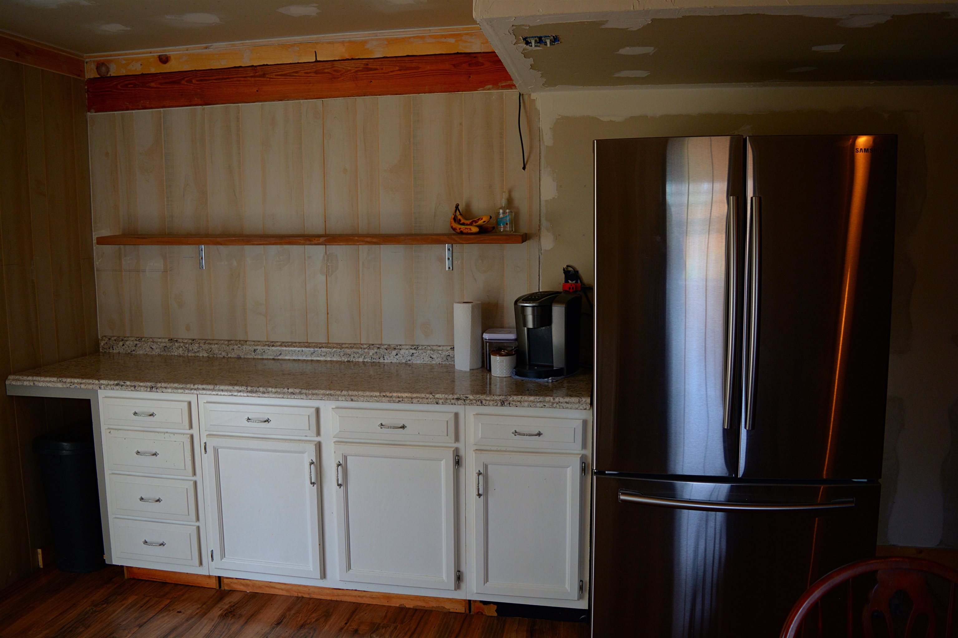 114 William Road Ruckersville, VA 22968 - Photo 17 of 19 a kitchen with a refrigerator and cabinets