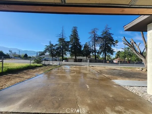 a view of a yard with a slide