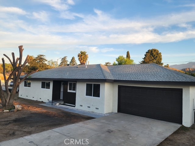 693 West Wilson Street Banning, CA 92220 - Photo 2 of 48 a view of a house with a yard