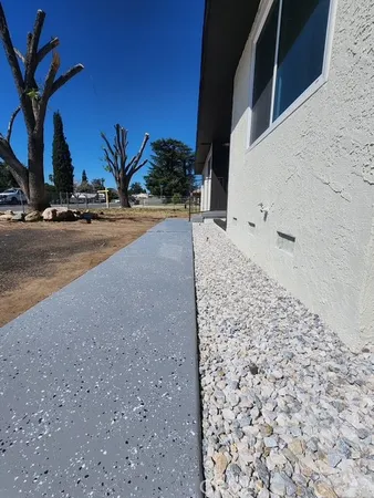 a view of a road with a building in the background