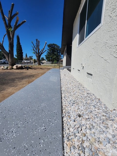 693 West Wilson Street Banning, CA 92220 - Photo 6 of 48 a view of a road with a building in the background