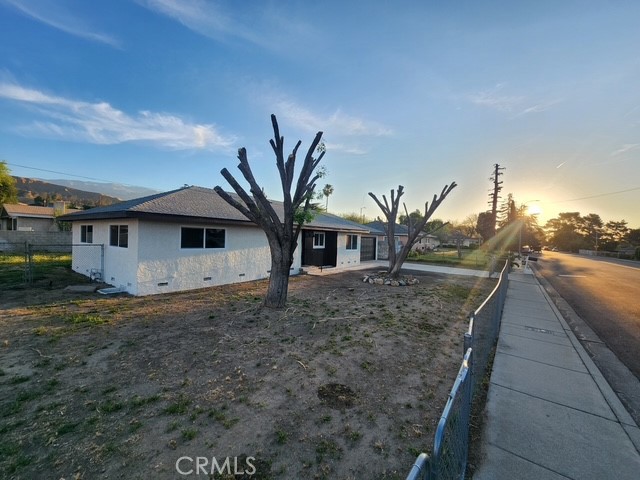 693 West Wilson Street Banning, CA 92220 - Photo 7 of 48 a view of a house with a backyard