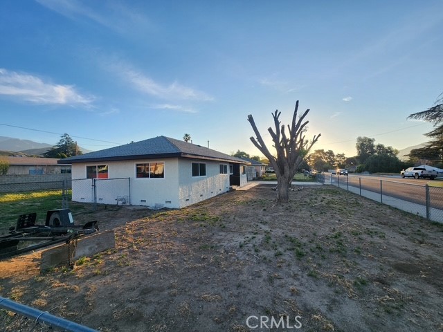 693 West Wilson Street Banning, CA 92220 - Photo 8 of 48 a front view of a house with a yard