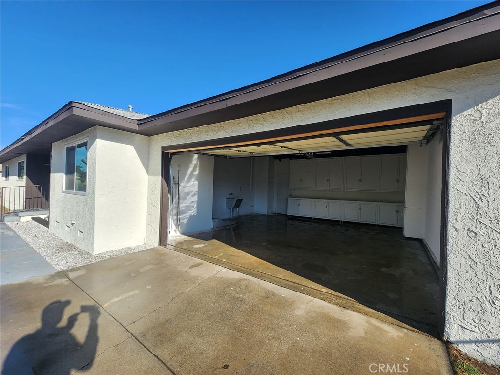 693 West Wilson Street Banning, CA 92220 - Photo 9 of 48 a front view of a house with a yard