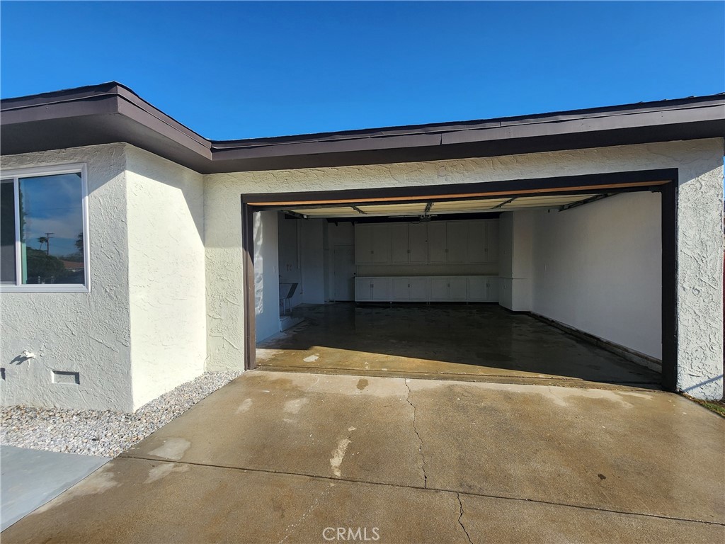 693 West Wilson Street Banning, CA 92220 - Photo 10 of 48 a view of garage with a small cabin
