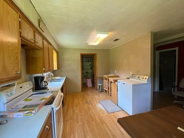 a bed room with a bed and a television