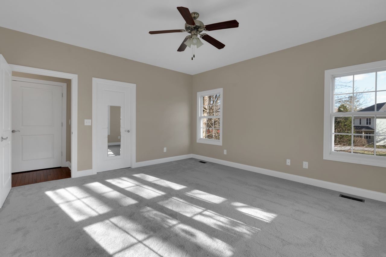 111 Reed's Lane Sewanee, TN 37375 - Photo 20 of 36 a view of a livingroom with a ceiling fan and window