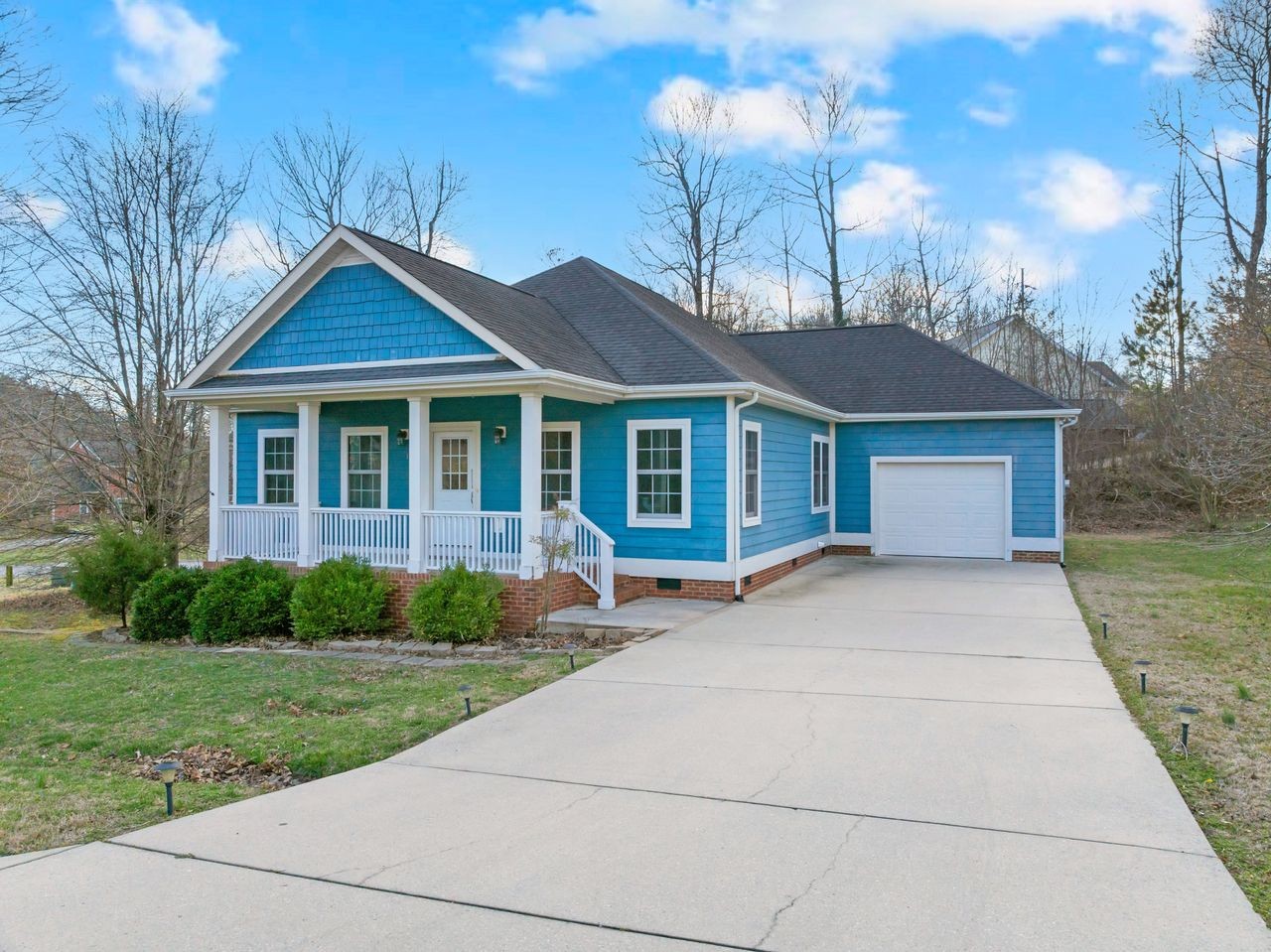111 Reed's Lane Sewanee, TN 37375 - Photo 2 of 36 a front view of a house with garden