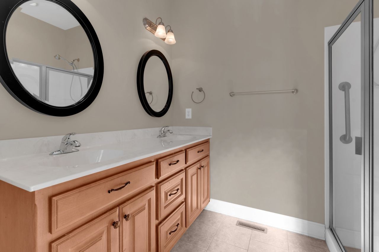 111 Reed's Lane Sewanee, TN 37375 - Photo 21 of 36 a bathroom with a sink and a mirror