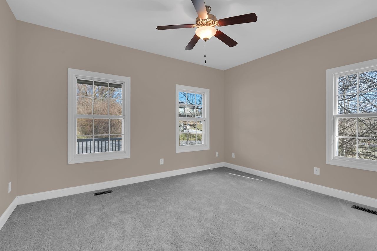 111 Reed's Lane Sewanee, TN 37375 - Photo 27 of 36 a view of an empty room with a window