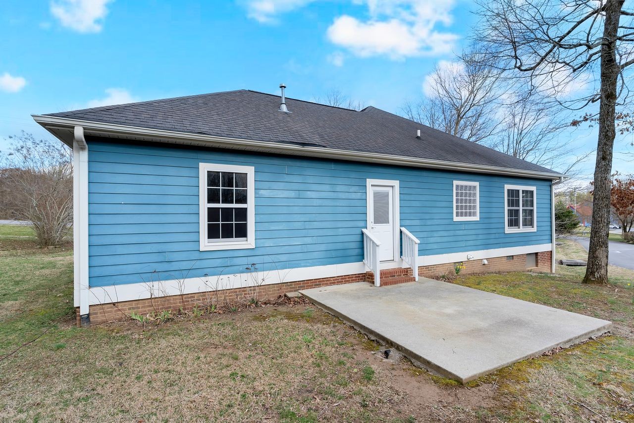 111 Reed's Lane Sewanee, TN 37375 - Photo 34 of 36 a house that has a tree in front of it