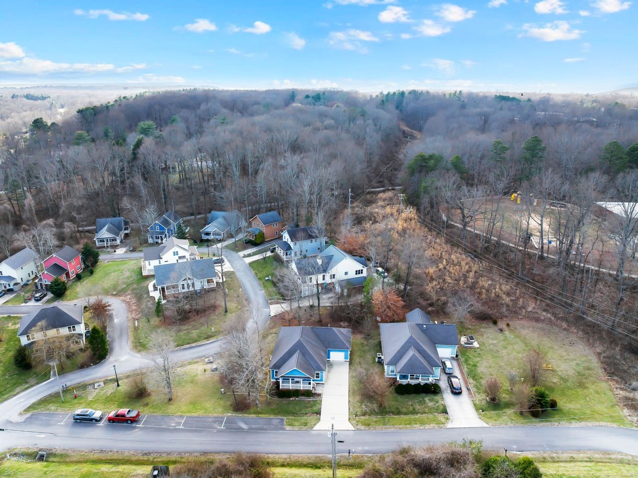 111 Reed's Lane Sewanee, TN 37375 - Photo 4 of 36 an aerial view of a houses with yard