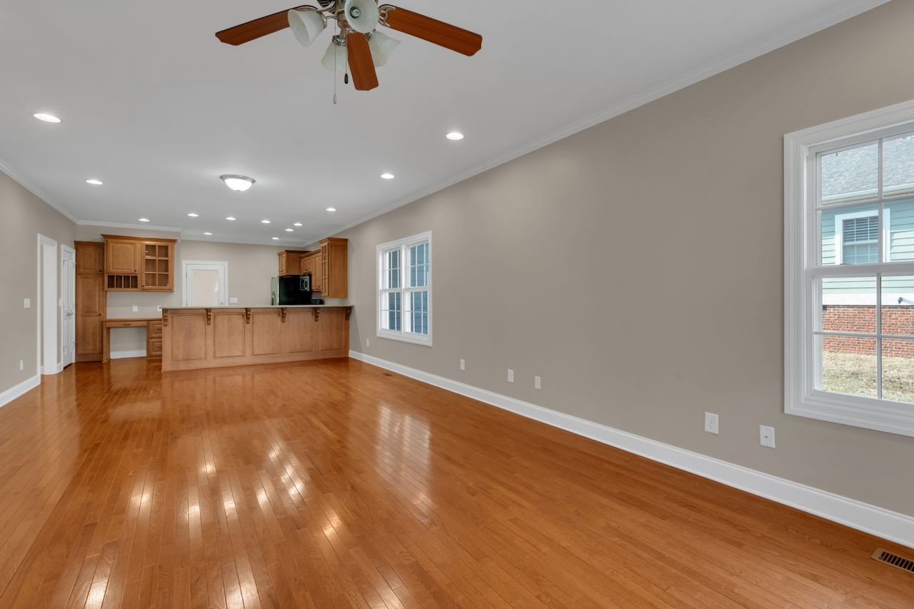 111 Reed's Lane Sewanee, TN 37375 - Photo 8 of 36 a view of empty room with wooden floor and window