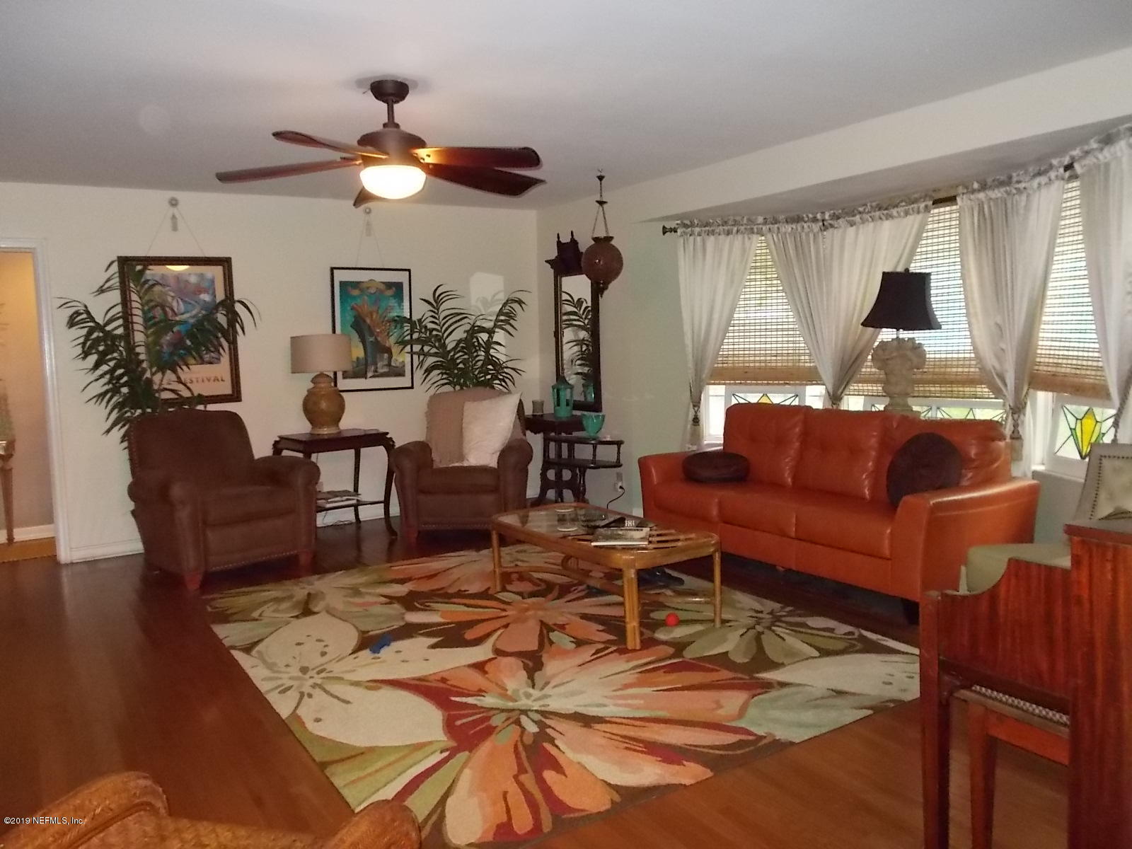1501 River Bluff Road North Jacksonville, FL 32211 - Photo 14 of 33 a living room with furniture and a large window