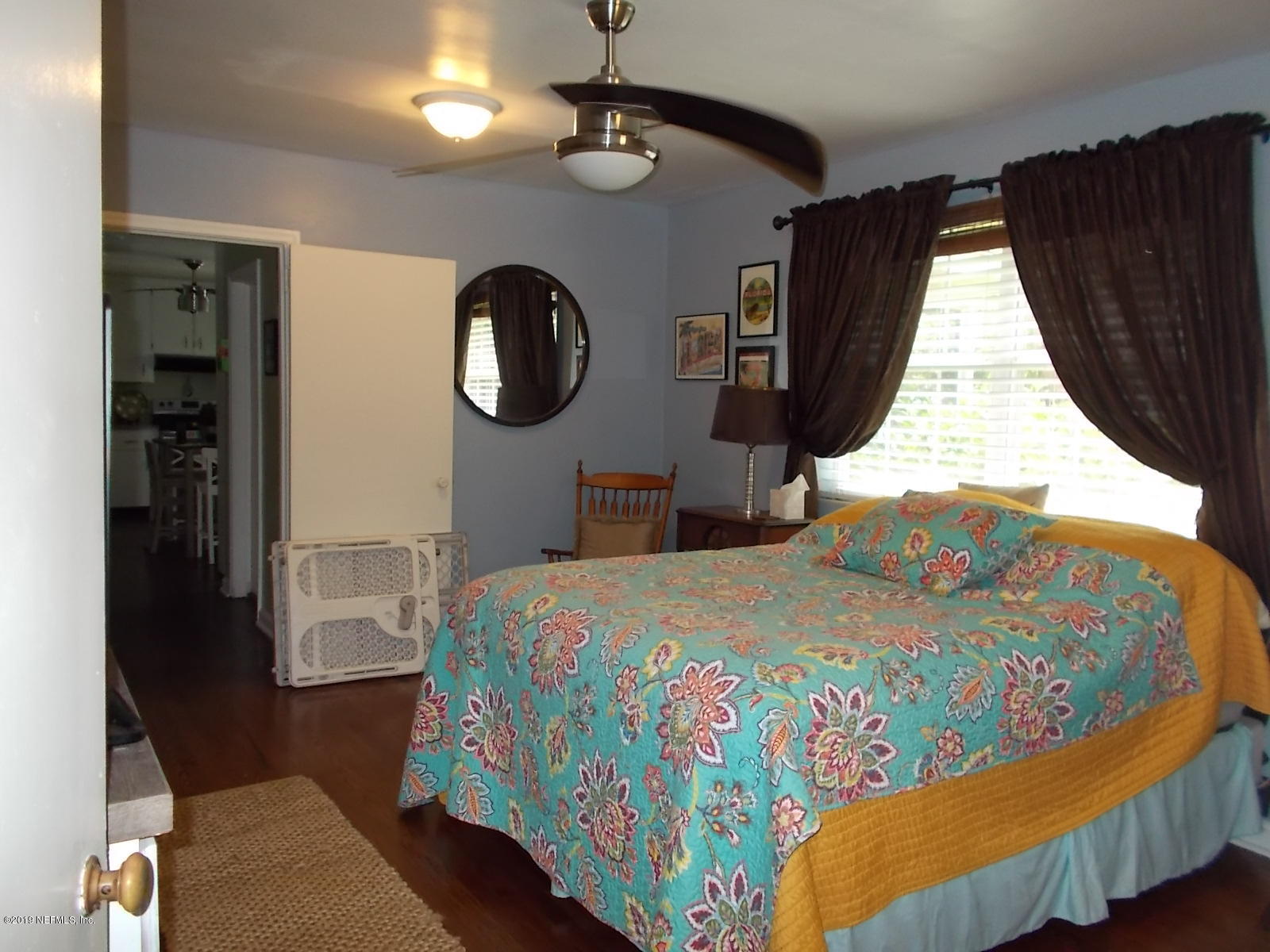 1501 River Bluff Road North Jacksonville, FL 32211 - Photo 18 of 33 a bedroom with bed and window