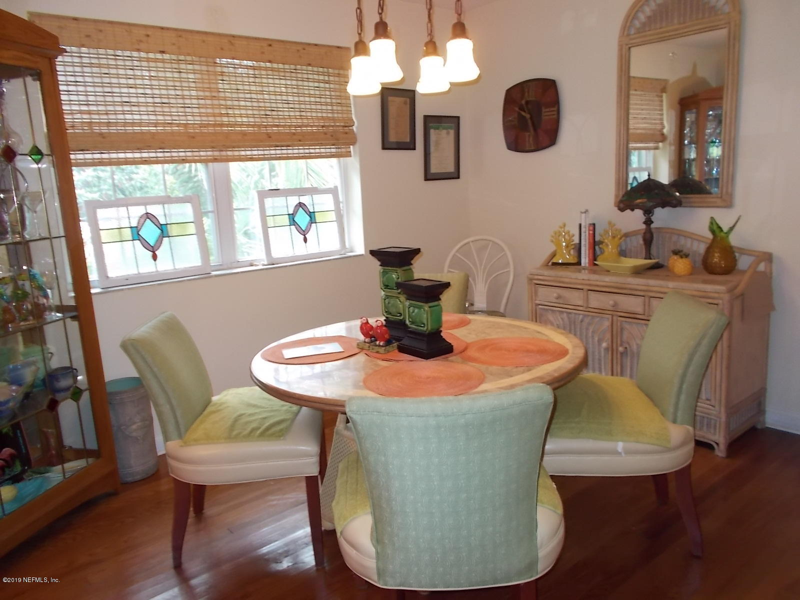 1501 River Bluff Road North Jacksonville, FL 32211 - Photo 2 of 33 a dining room with table chairs and a chandelier