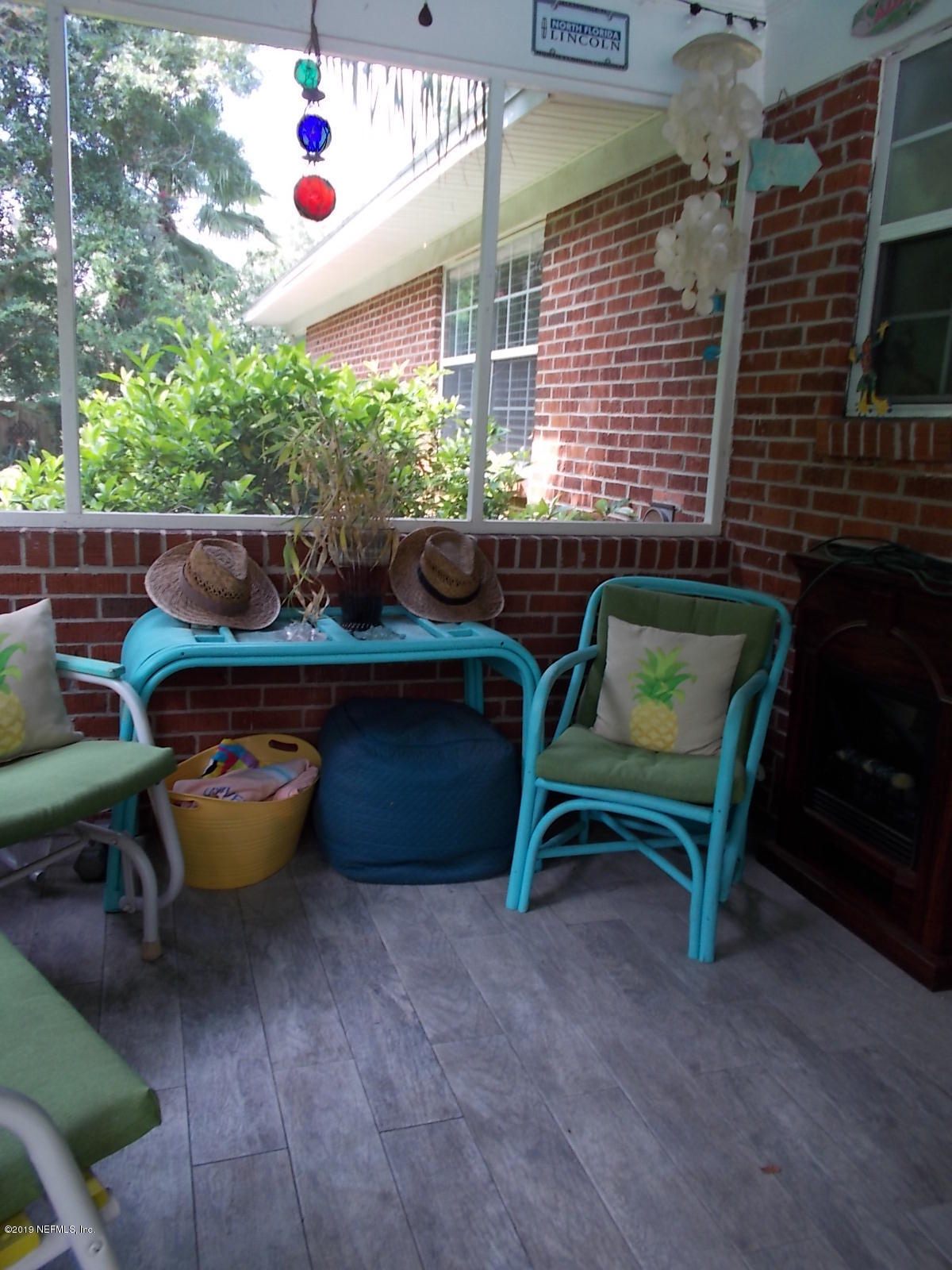 1501 River Bluff Road North Jacksonville, FL 32211 - Photo 22 of 33 a backyard of a house with yard and outdoor seating