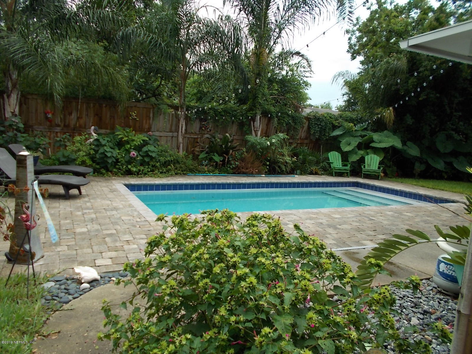 1501 River Bluff Road North Jacksonville, FL 32211 - Photo 26 of 33 a view of a garden with lawn chairs
