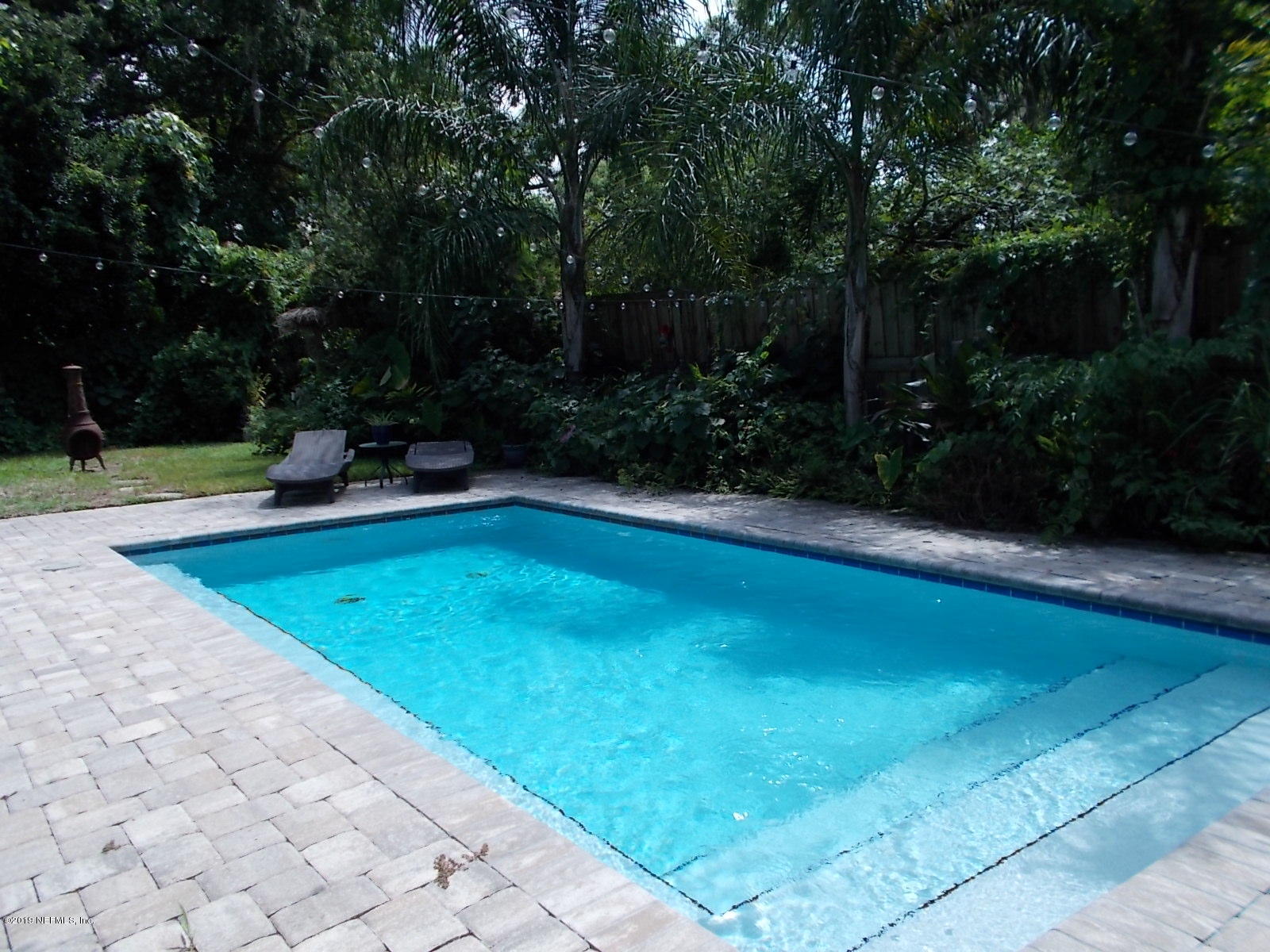 1501 River Bluff Road North Jacksonville, FL 32211 - Photo 29 of 33 a view of a swimming pool with a patio