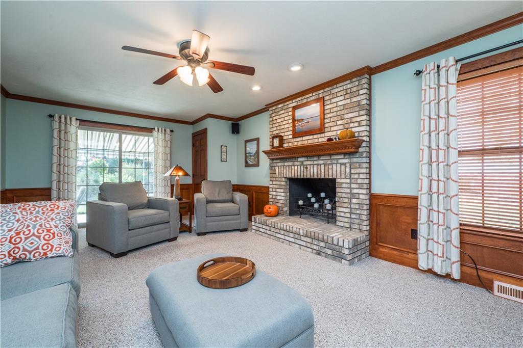 108 Pebble Court McKees Rocks, PA 15136 - Photo 11 of 39 a living room with furniture and a fireplace