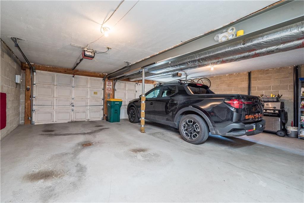 108 Pebble Court McKees Rocks, PA 15136 - Photo 31 of 39 a view of parking garage with cars