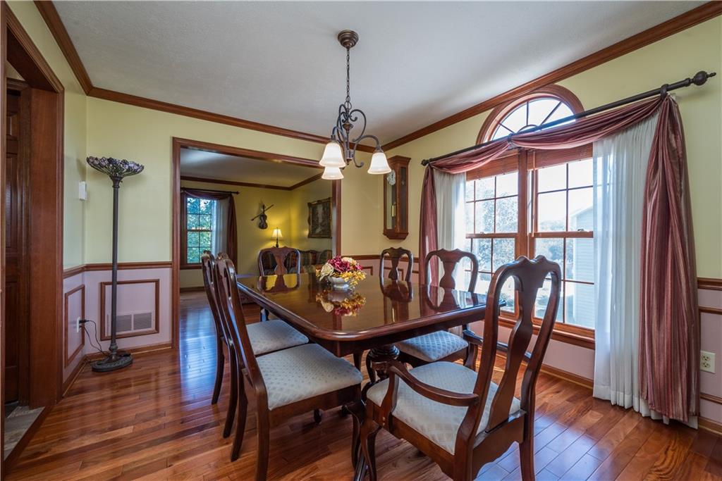 108 Pebble Court McKees Rocks, PA 15136 - Photo 8 of 39 a view of a dining room with furniture window and wooden floor