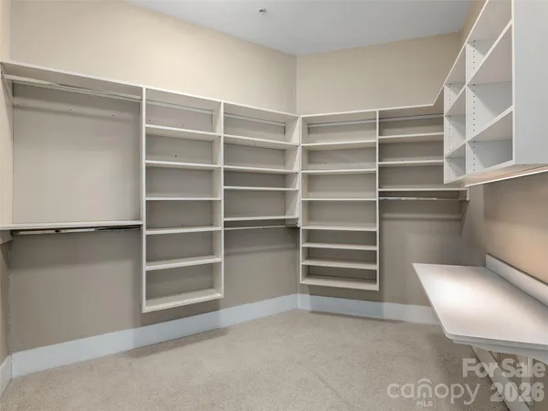 a view of an empty room with empty racks
