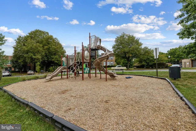 a view of a park with swings