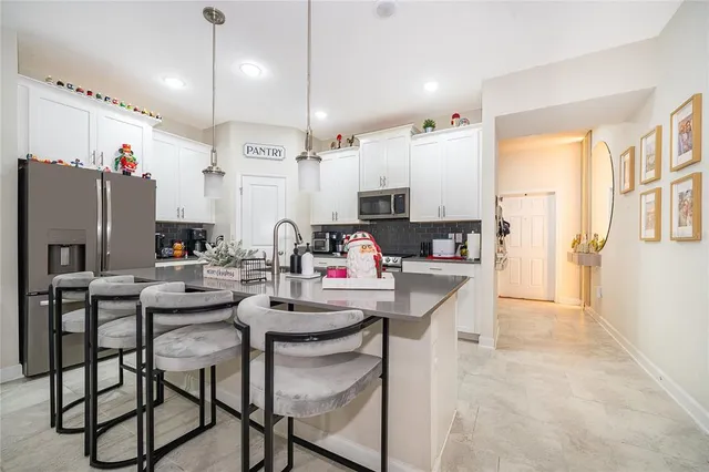 a view of a livingroom with furniture and window