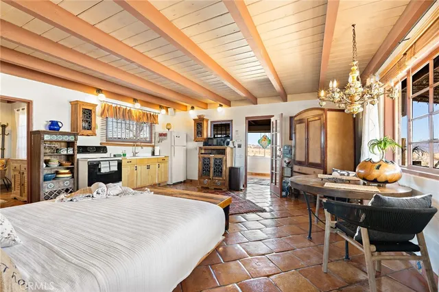 a bed room with a bed and furniture